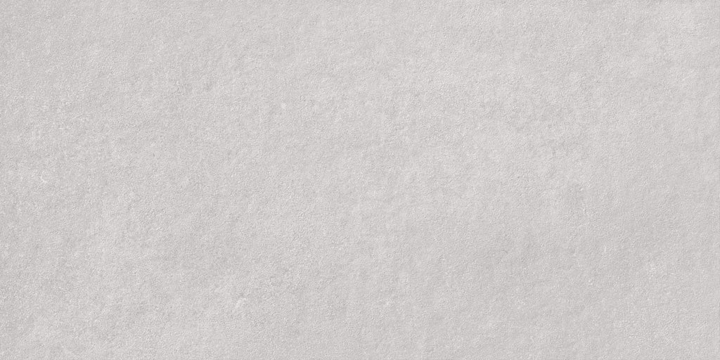 Azuvi Camlot Azulejo Wandfliese in Cloud, moderne dezente Farboptik mit fein strukturierter, matter Oberfläche aus Steingut. Rektifiziert im Format 60×120 cm für stilvolle, ruhige Wandgestaltungen in Bad, Küche und Wohnbereichen im Innenbereich mit zeitgemäßer, klarer Flächenwirkung.
